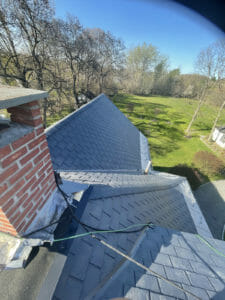 Home in New York with asphalt shingle roof