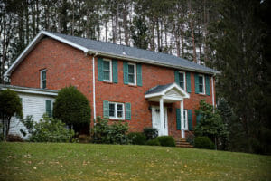 Home in New York with asphalt shingle roof