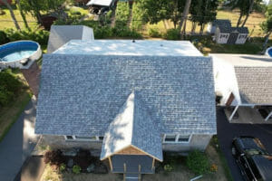 Home in New York with asphalt shingle roof