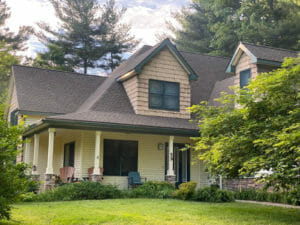 Home in New York with asphalt shingle roof